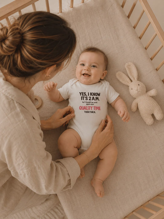 Quality Time baby bodysuit lifestyle photo, white, evening nursery crib scene
