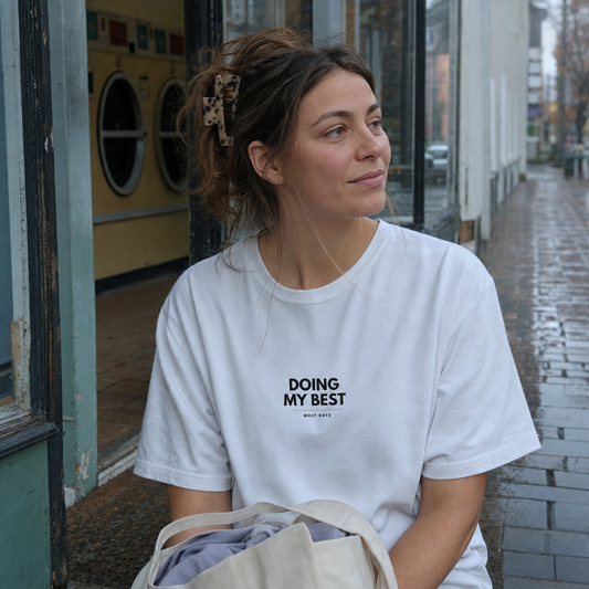Doing My Best tee worn outside a launderette