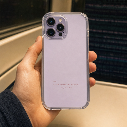 Clear iPhone case printed “12% Low Power Mode is my personality” in dark rose lettering