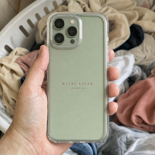 Clear iPhone case printed “Maybe later, probably not” in dark rose lettering