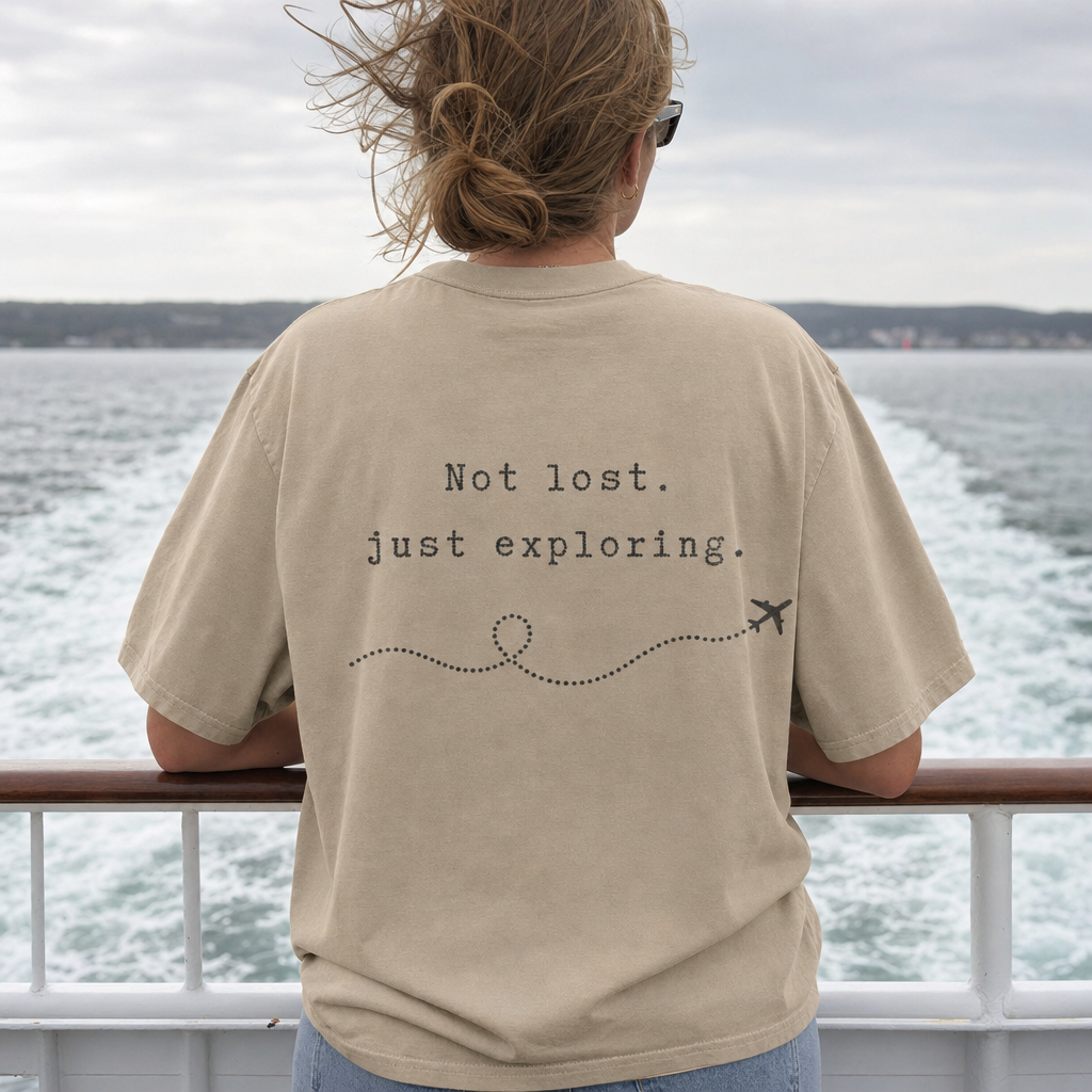 Not Lost Just Exploring oversized tee worn on a ferry deck