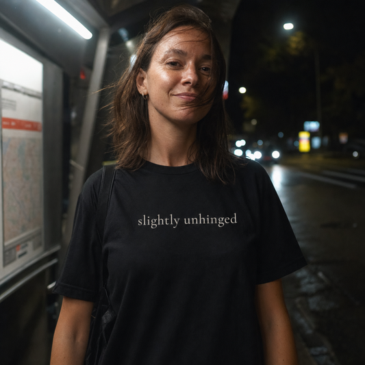 Slightly Unhinged tee worn at a night bus stop