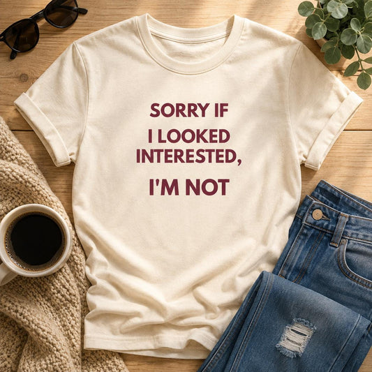 Sorry If I Looked Interested I'm Not tee styled flat with coffee and jeans