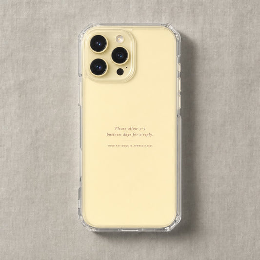 Clear iPhone case printed “Please allow 3-5 business days for a reply” in dark rose lettering